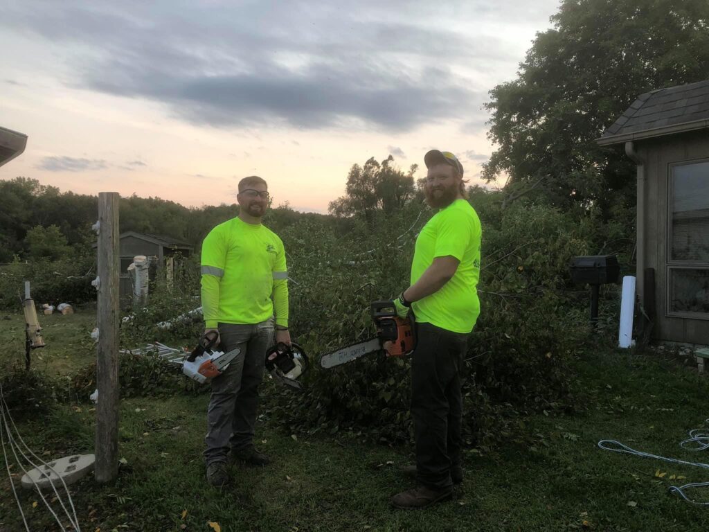 Ole Man RB's owners working on tree removal services in Greenville MI